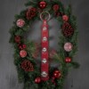Santa loves our hand made sleigh bell door hanger by Duvall Leatherwork