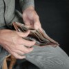 man using trifold wallet made in USA