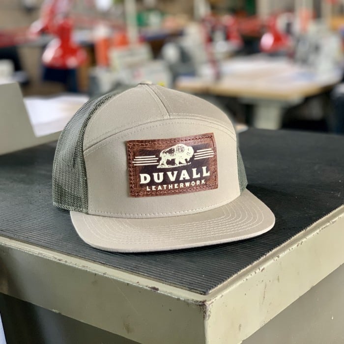 Khaki trucker hat with leather patch