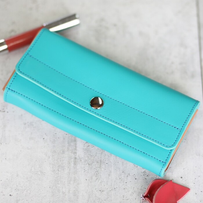 Brilliant women's turquoise lether wallet shown closed from the front