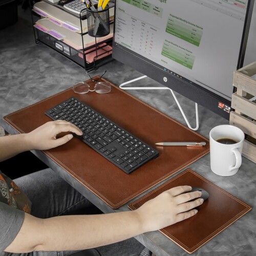 Light brown dask and mouse pad on desktop