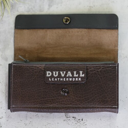 Full grain women's gray leather walle shown open to reveal the Duvall logo inside the front
