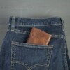Men's bison leather trifold wallet in jean pocket