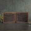 Open view of bifold vintage brown wallet