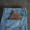 Handcrafted bifold wallet with ID window in jean pocket