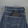 Men's Black leather minimalist wallet in jean pocket