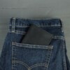 Men's passport wallet in jean pocket