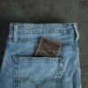 Men's genuine vintage brown leather ID wallet in jean pocket