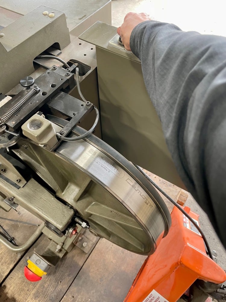 Turning on a Fortuna SAS leather splitting machine