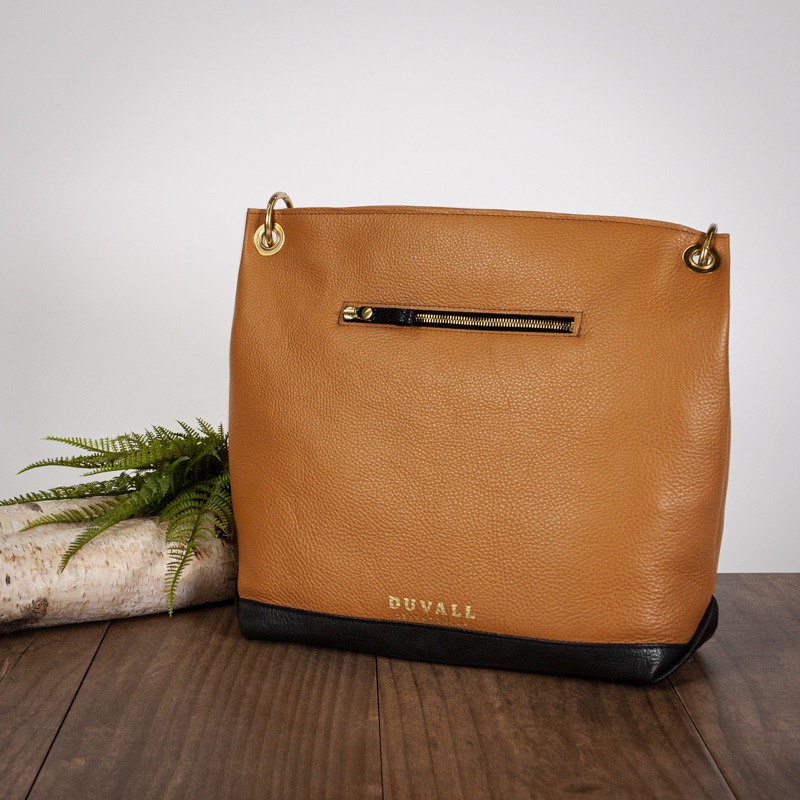 Women's genuine leather tan and black bag