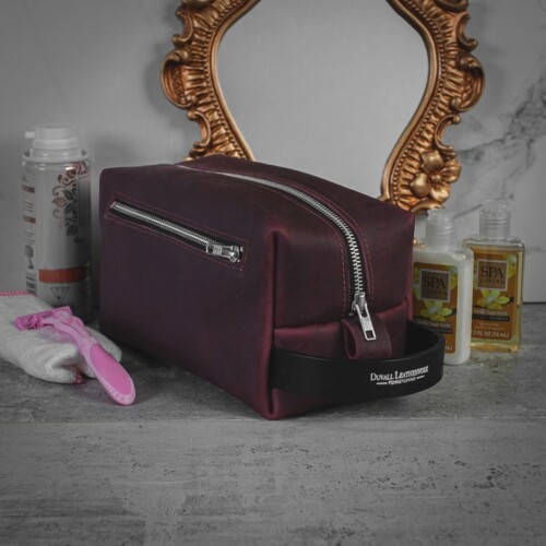 Women's red leather toiletry bag that can hold alot