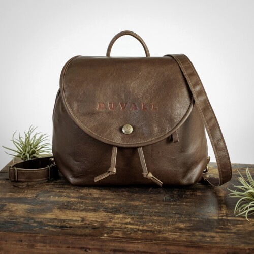 Beautiful dark brown leather backpack with adjustable straps