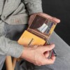 Not only a Vintage Brown Leather Wallet but also Notebook by Duvall Leatherwork