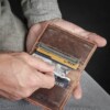 What does the vintage brown Credit Card Wallet hold by Duvall Leatherwork