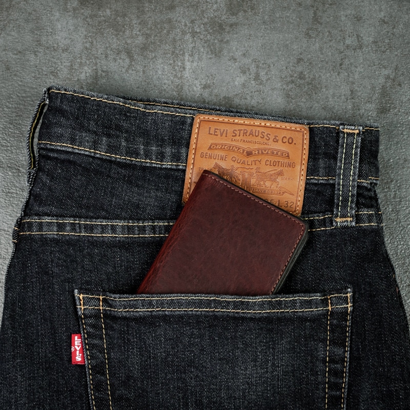 Love how this credit card wallet fits in any pant pocket for your every day usage on a slate background.