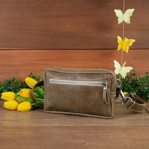 Tundra fanny bag with front zipper pocket in studio spring setting