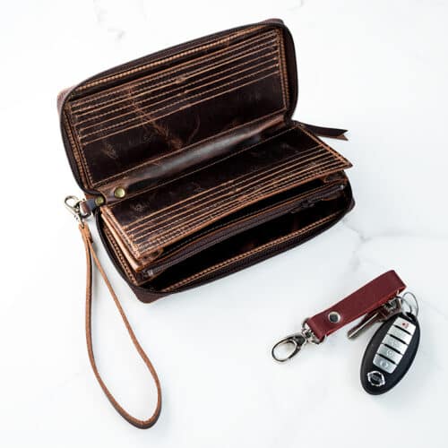 Interior view of brown wallet with card slots and interior zipper pouch