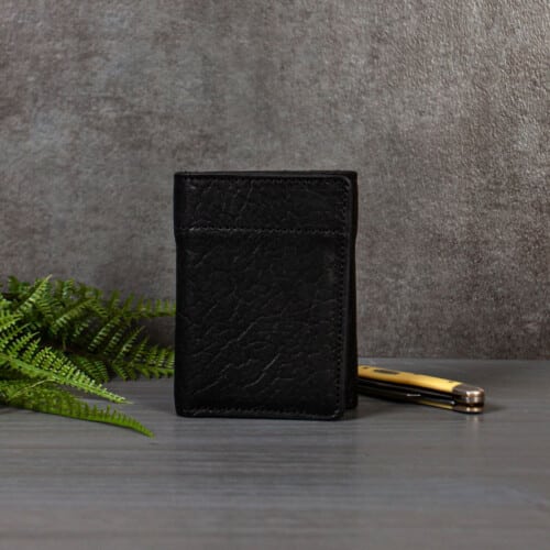 Black leather trifold wallet for men made in the USA from bison leather.
