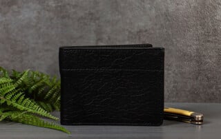 Black leather wallet with ID window for men.
