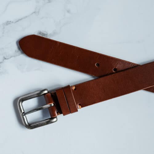 flat lay chestnut brown leather belt