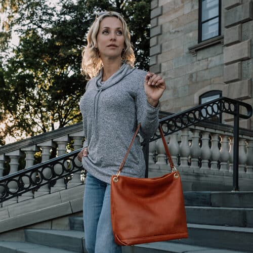 Handcrafted leather handbag made from orange leather