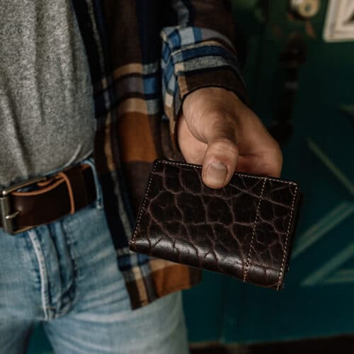 Man holding chocolate bison wallet