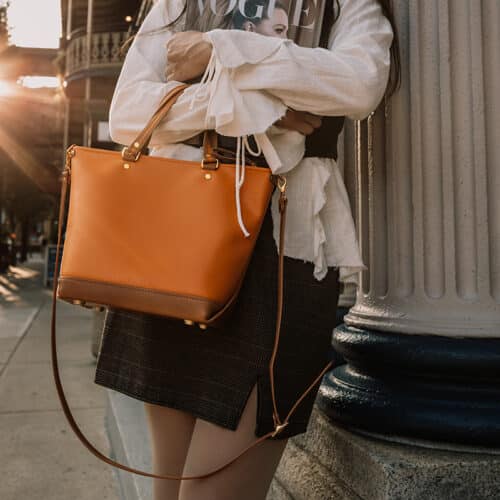 Orange leather handbag perfect for fall and winter.